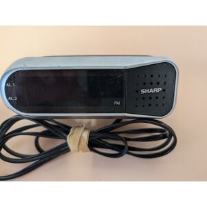 Sharp Digital Compact Clock Radio LED Display Battery Backup Snooze Model SPC100